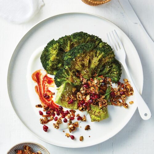 Broccoli steaks with harissa yoghurt and savoury granola