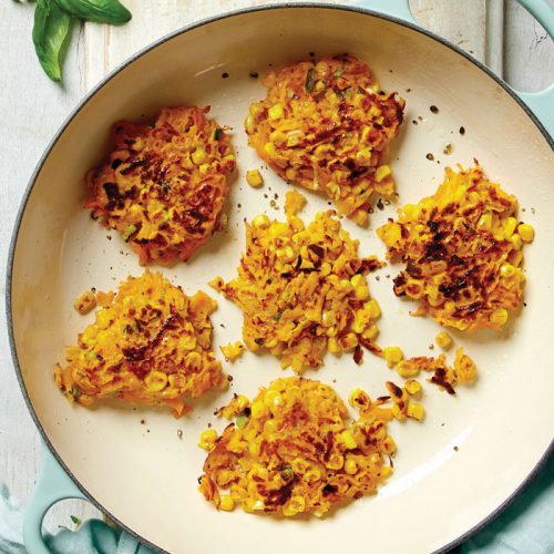 Corn and pumpkin fritters with herby hummus