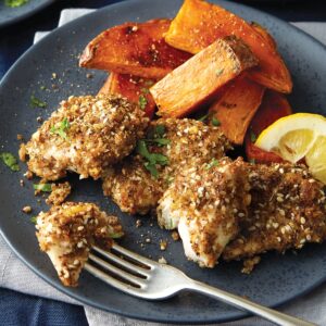 Crispy fish bites with wedges and slaw