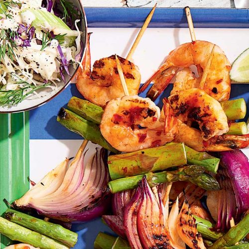 Harissa prawn skewers with dill and apple coleslaw