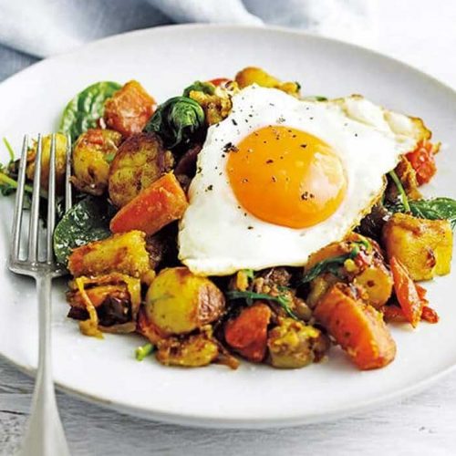 Indian-spiced bubble and squeak with fried eggs