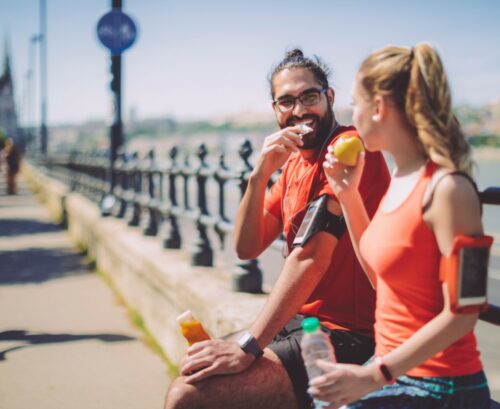 Couple exercising and eating