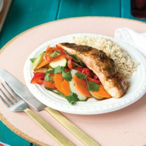 Jerk glazed salmon with Caribbean courgette slaw and brown rice