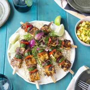 Jerk spiced tofu and vege kebabs on brown rice