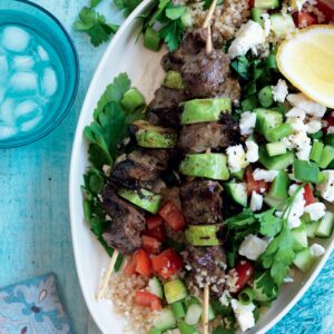 Lamb souvlaki with bulgar, tomato and feta salad