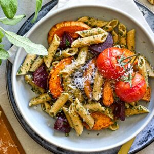 Pasta with walnut-sage pesto and roast vegetables