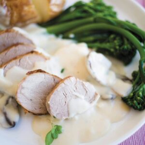 Pork with herby white wine sauce