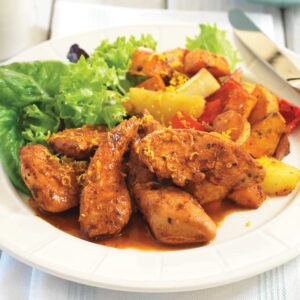 Portuguese chicken tenderloins on warm roasted vegetable salad