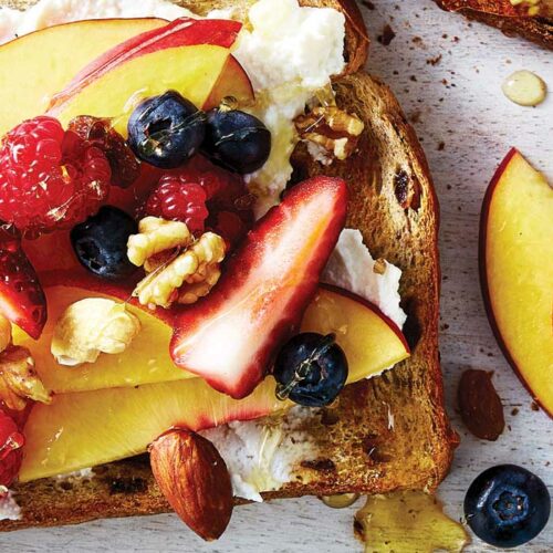 Raisin toast with ricotta, fruit and seeds