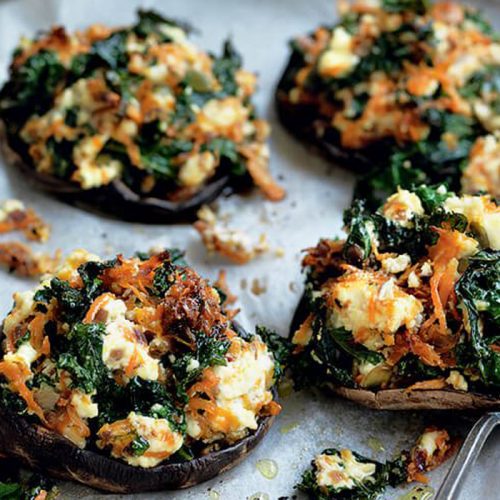 Mushrooms stuffed with kale, ricotta and seeds