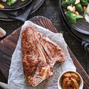 T-bone steak with miso horseradish glaze and white bean salad