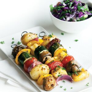 Vegetable and haloumi kebabs with tzatziki coleslaw